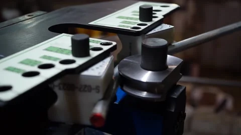 Industrial machine bends metal Stock Footage 163566620