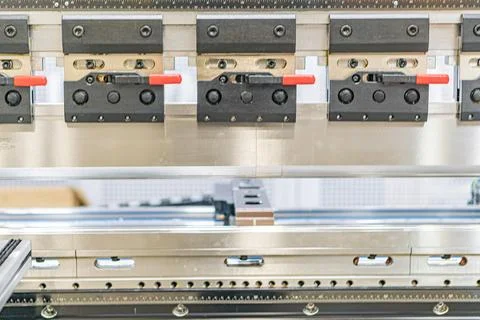 Industrial machine with parallel linear rails, black rectangular units with r 스톡 사진