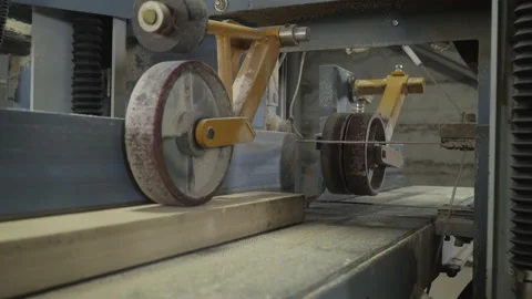 Industrial machine is processing the lumber board at the manufacturing plant Stock Footage 237851419