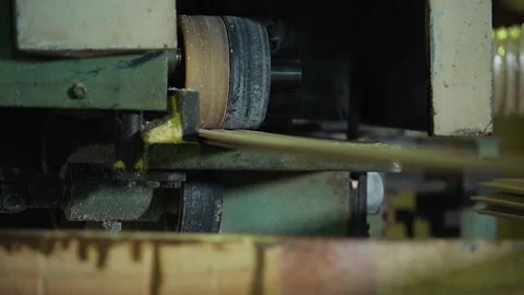 Industrial machine is processing timber planks at the woodworking factory Stock Footage 235662885