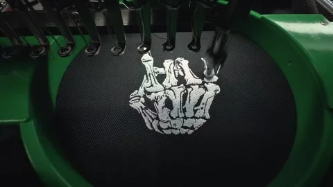 Industrial Machine Stitching White Skeleton Hand Rock Sign Logo on Black Fa.. 스톡 동영상 332205767