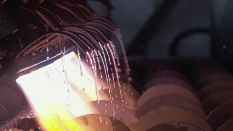 Industrial manufacturing equipment processing stone with fire at factory Stock Footage 220471939