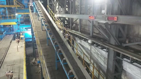 Industrial manufacturing facility featuring a complex network of automated Stock Footage 325700975