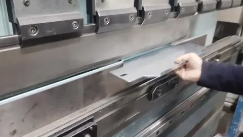 Industrial Metal Sheet Bending Process with Hydraulic Press Brake Stock Footage 336692182