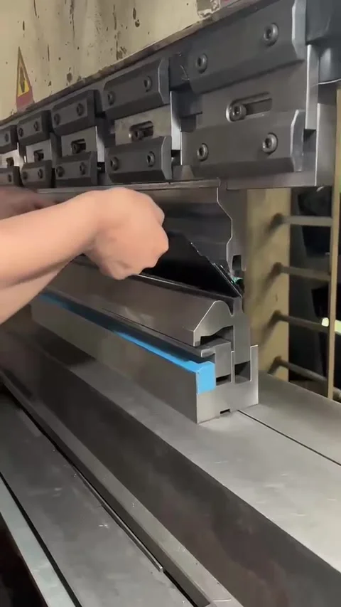 Industrial Metal Sheet Bending Process on CNC Press Brake Machine Stock Footage 337764986