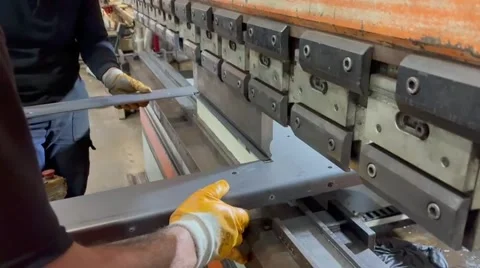 Industrial metal sheet bending process on press brake machine Stock Footage 348059969