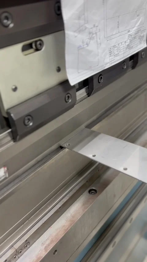 Industrial metal sheet bending process on press brake machine Stock Footage 348399763