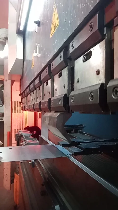 Industrial metal sheet bending process on press brake machine Stock Footage 348948883