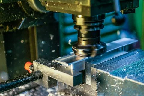 Industrial metalworking cutting process by cnc milling cutter machine Stock Photos
