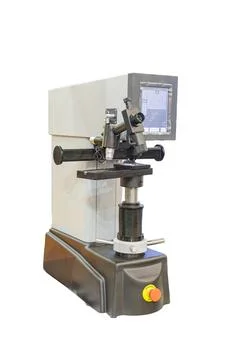 Industrial microscope with digital screen, adjustable column, sleek white b.. Stock Photos