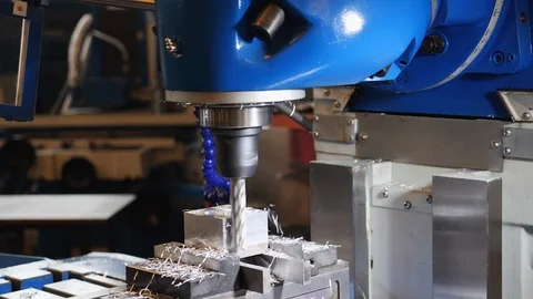Industrial milling machine work - camera orbit around, close up Video stock 126940999