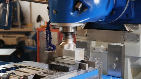Industrial milling machine work - static camera, slow motion Stock Footage 126940982