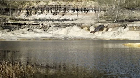 Industrial Mining Abandoned Pit With Erosion and Leaching Stock Footage 73870988