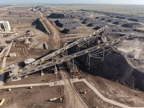 Industrial mining operation moving aggregates using conveyor belts Stock Photos