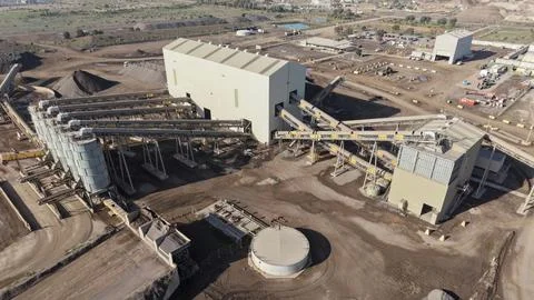Industrial mining operation moving raw materials on conveyor belts Stock Photos