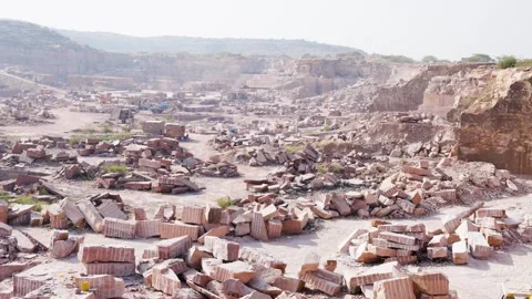 Industrial mining site with extracted stone slabs in Aravalli mountain rang.. Vídeo Stock 324964115