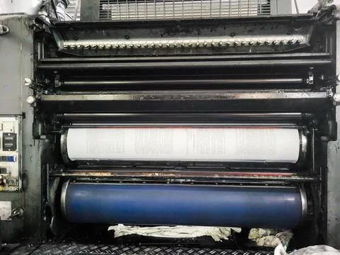 Industrial offset printing machine rollers close-up Stock Photos