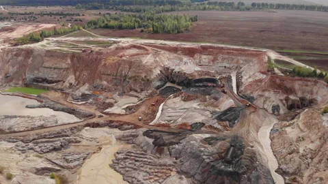 Industrial of opencast mining quarry with lots of excavators and trucks at work. Stock Footage 141285928
