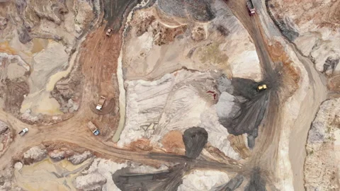 Industrial of opencast mining quarry with lots of machinery at work. Aerial top Stock Footage 141289013
