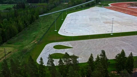 Industrial park construction with large paved foundation for development Stock Footage 340884645