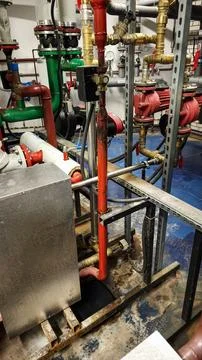 Industrial pipe system technical room plumbing maintenance Stock Photos