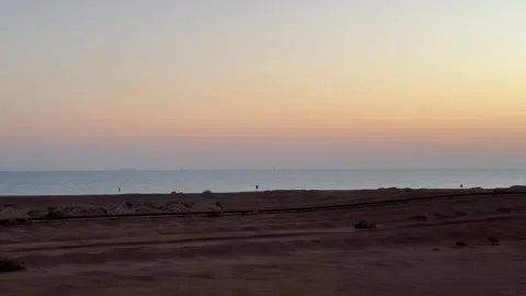 Industrial Pipeline Running Through Desert Coastal Landscape at Sunset Egypt Stock Footage 337724637