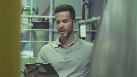 Industrial plant worker using digital tablet Stock Footage 75168420