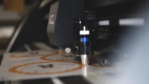 Industrial plotter for cuttering paper in print shop, close-up view. Modern 動画素材 168183458