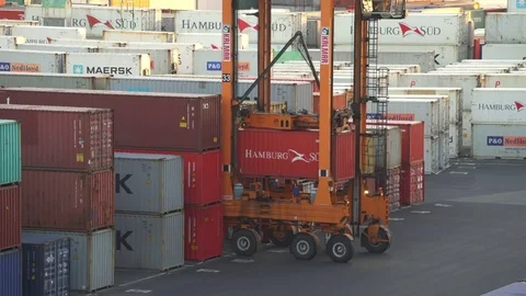 Industrial port with containers and loader Stock Footage 76376496