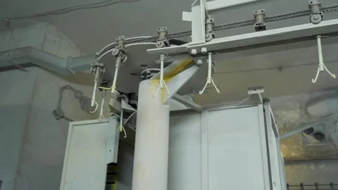 Industrial powder coating conveyor system line Stock Footage 335522899