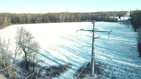 Industrial power lines going through nature in winter, Stock Footage 169973187