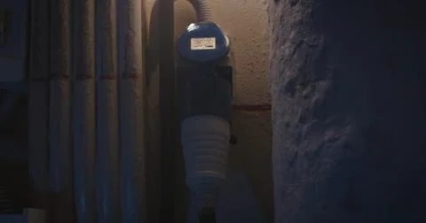 Industrial Power Socket on a Dimly Lit Wall Stock Photos