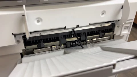 Industrial Printer printing out multiple copies of paper 4k Stock Footage 271167077