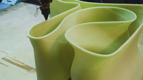 Industrial printer prints a complex plastic part Stock Footage 276355313