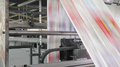 Industrial printer releasing folded paper brochures in a workshop Vídeo Stock 318134471