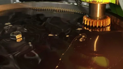 Industrial process of mixing technical oil. Close-up Stock Footage 166025304