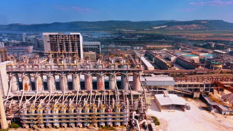 Industrial processing installation with row of tall vertical columns Stock Footage 340080094