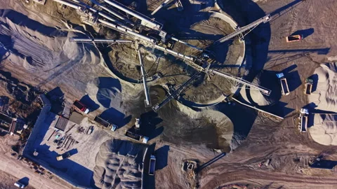 Industrial processing of materials at a construction site in bright daylight Stock Footage 332027225