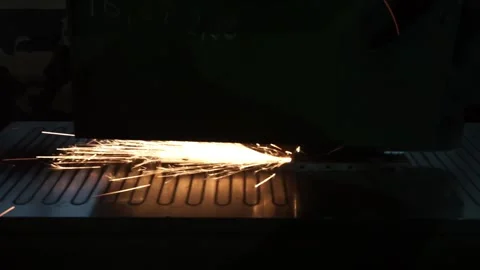 Industrial processing of metal, grinder with sparks Stock Footage 138312617