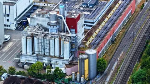 Industrial Processing Plant Beside Railway in Frenkendorf, Switzerland Stock Photos