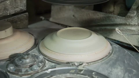 Industrial Production of Porcelain Tableware .Machine for Moulding Plates 4 Stock Footage 62792015