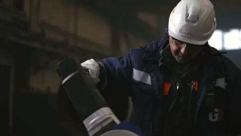 Industrial professional worker use saw cutting machine to cut metal tube. Stock Footage 161350488