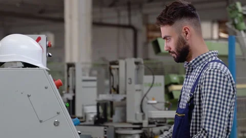 Industrial programmer checking control box status with computer Stock Footage 221424318