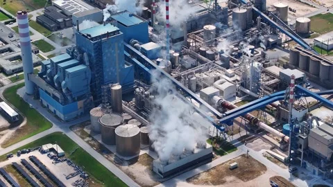 Industrial pulp mill and biomass power plant producing bioenergy Stock Footage 340311277