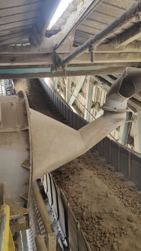 Industrial Raw Material Transfer via Conveyor Belt in Cement Factory Stock Footage 333340763