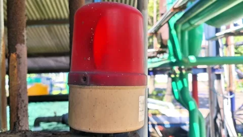 Industrial Red Warning Light Siren on Heavy Machinery for Emergency Alert Stock Footage 332057152