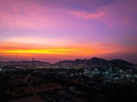 Industrial Refinery Complex Illuminated At Sunset In Si Racha Chon Buri Tha.. Stock Photos