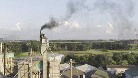 Industrial Rice Processing Facility with Visible Smoke in Rural Bangladesh Video stock 343532075