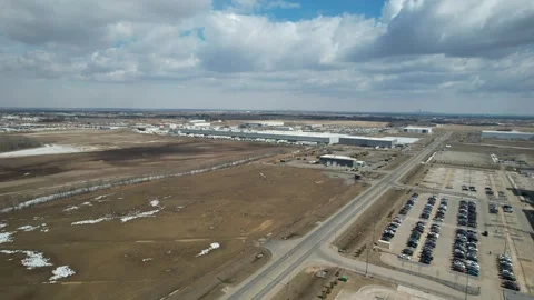 Industrial Road in Alberta in early Spring Stock Footage 258092989