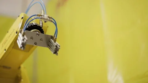 Industrial Robot arm active in factory. Stock Footage 87877643